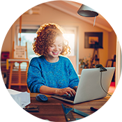 Woman using a Chromebook laptop