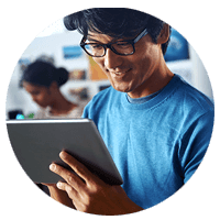 Businessman on tablet computer in office