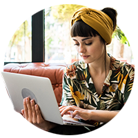 Woman working on her laptop remotely