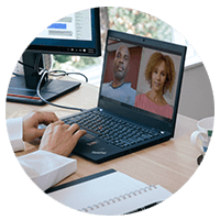 Person working in front of a laptop