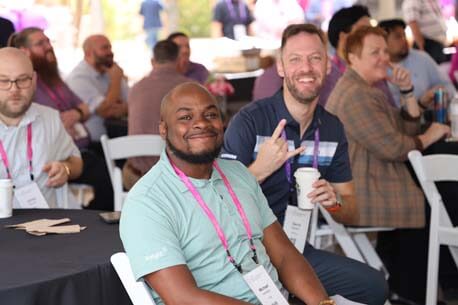 People smiling at the event