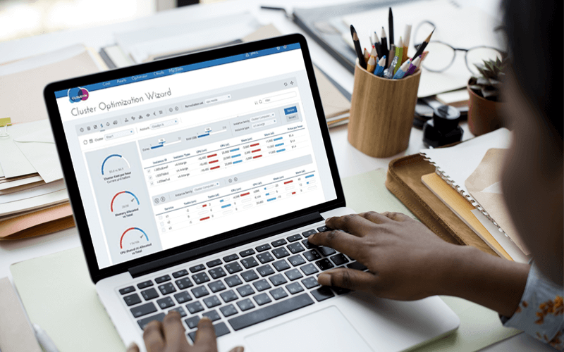 Woman using laptop device displaying Cloudyn software