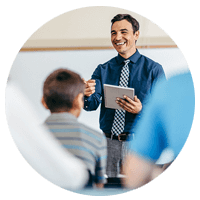 Teacher using tablet computer powered by Intel while teaching