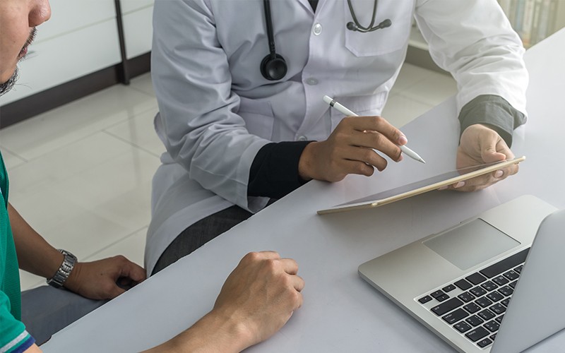 Doctor using tablet