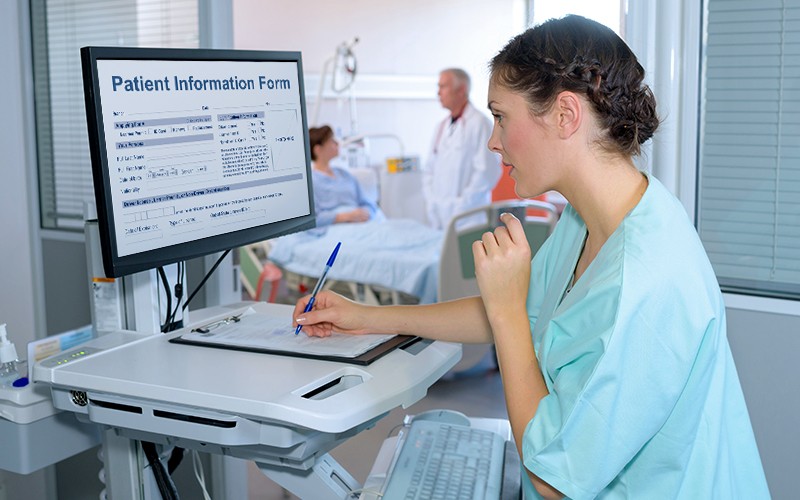 Nurse using computer