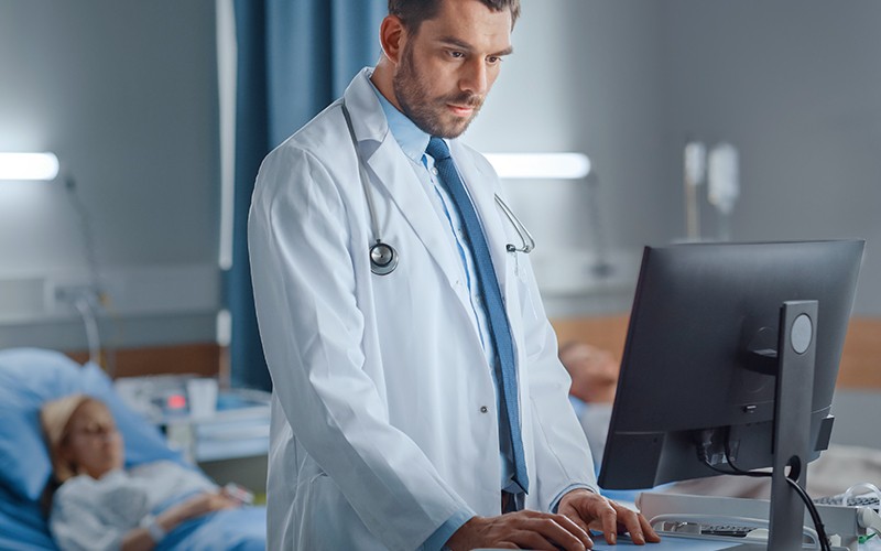 Doctor monitoring the patient