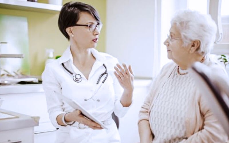 Nurse talking to a patient