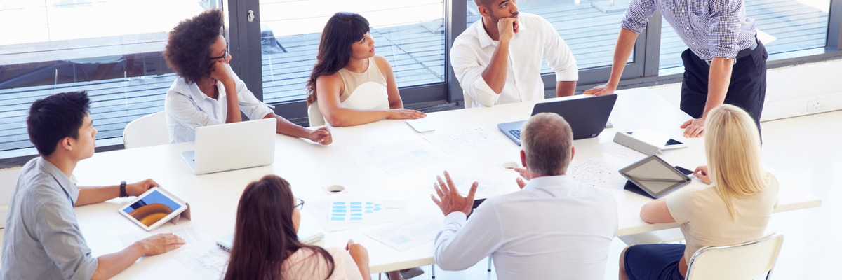 Business team meets around table