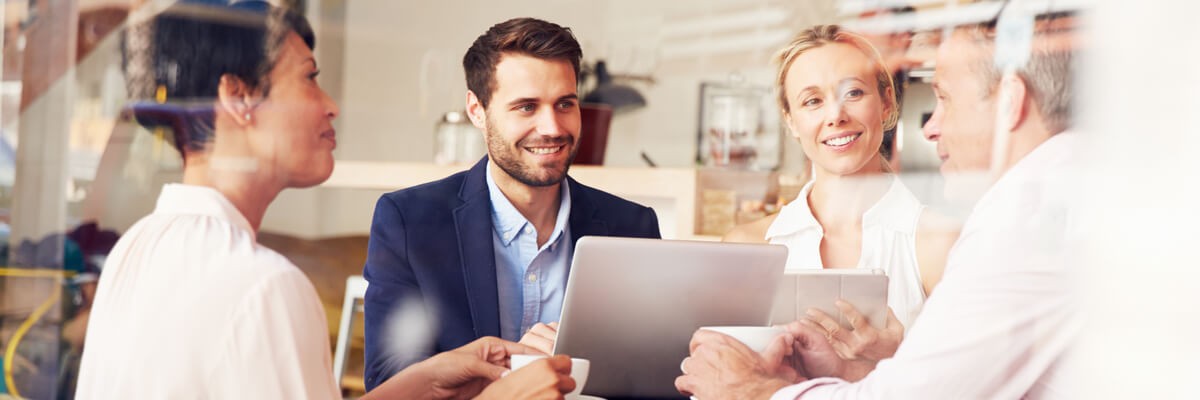 A group of people meeting for business