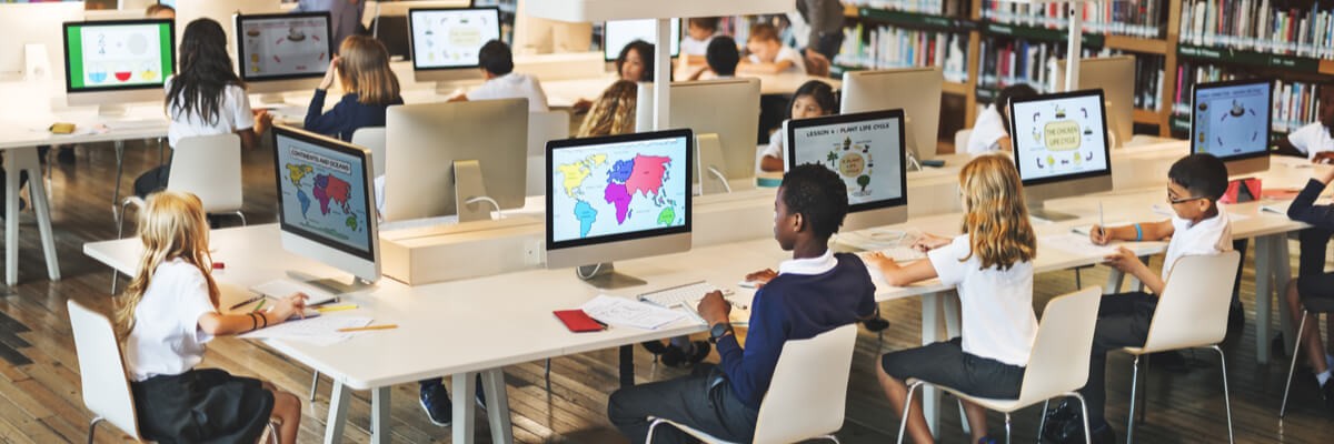 Students at school all working on computers