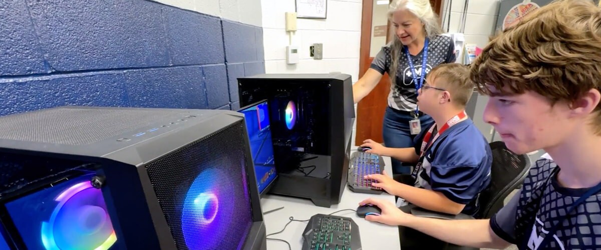 School age children playing Esports games in class