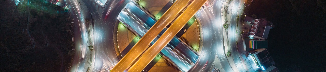 Circle of highway road intersection at dusk for transportation