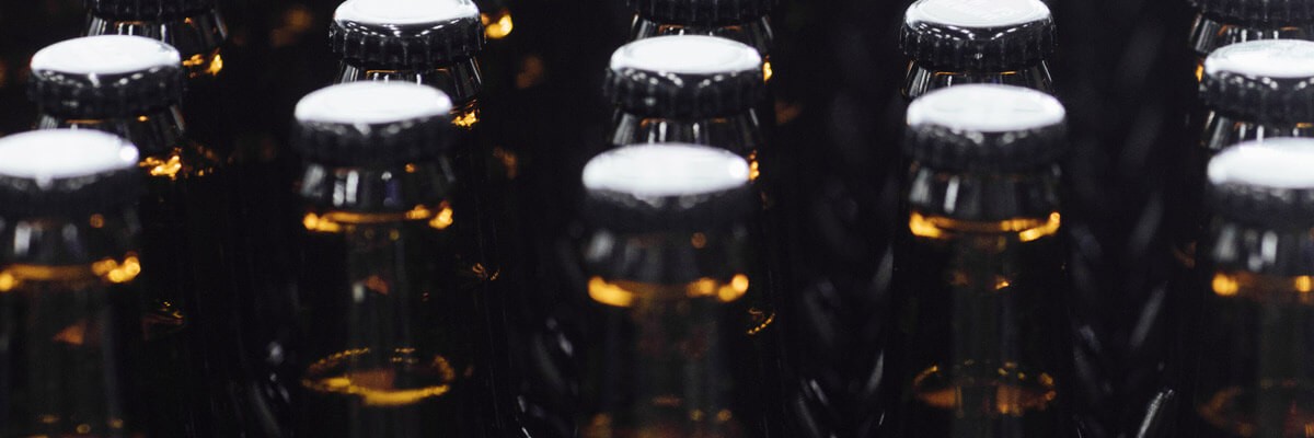 Bottles stacked in production line