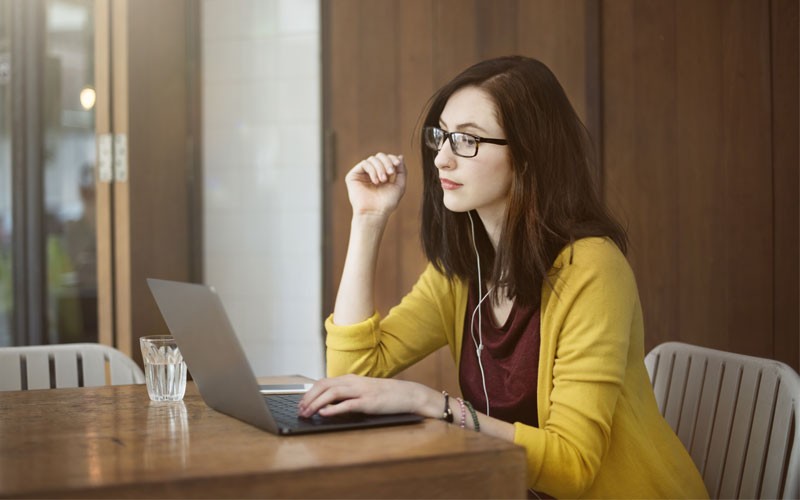 Business woman working on laptop computer