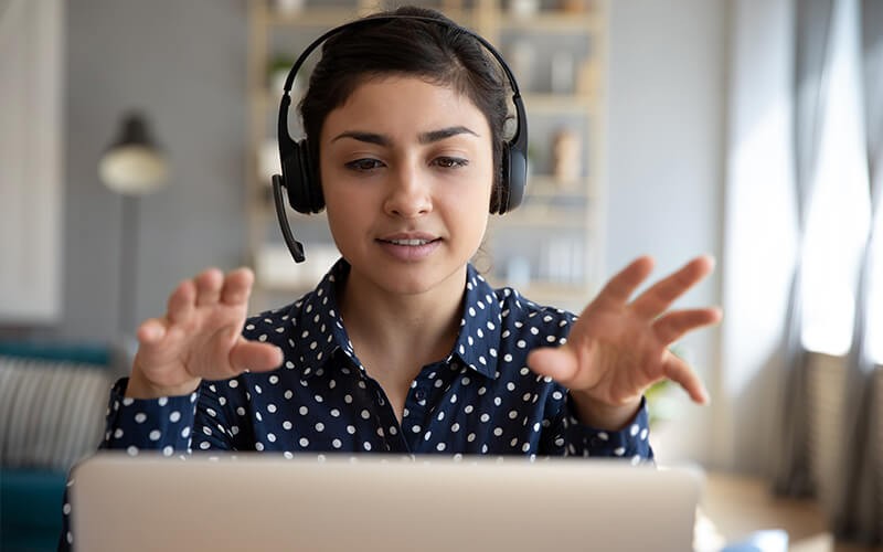 Woman using GoToWebinar on desktop