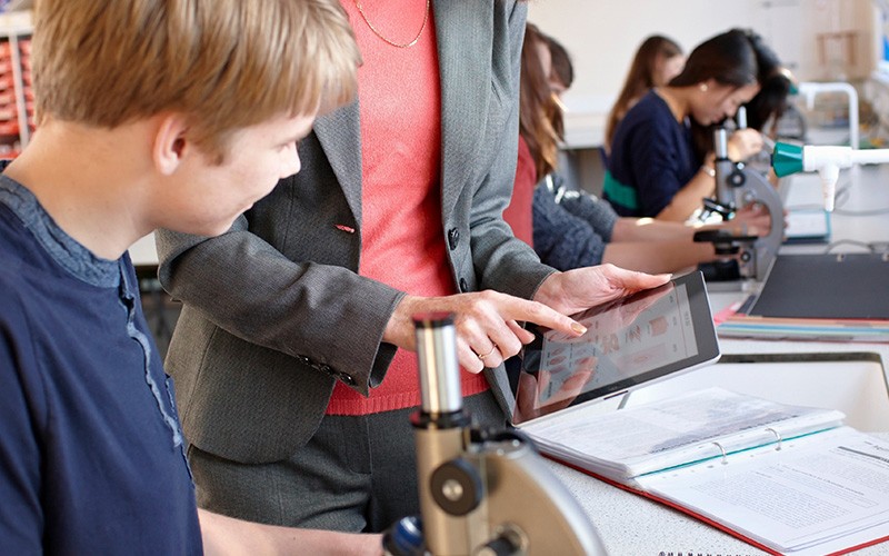 Teacher teaching a student