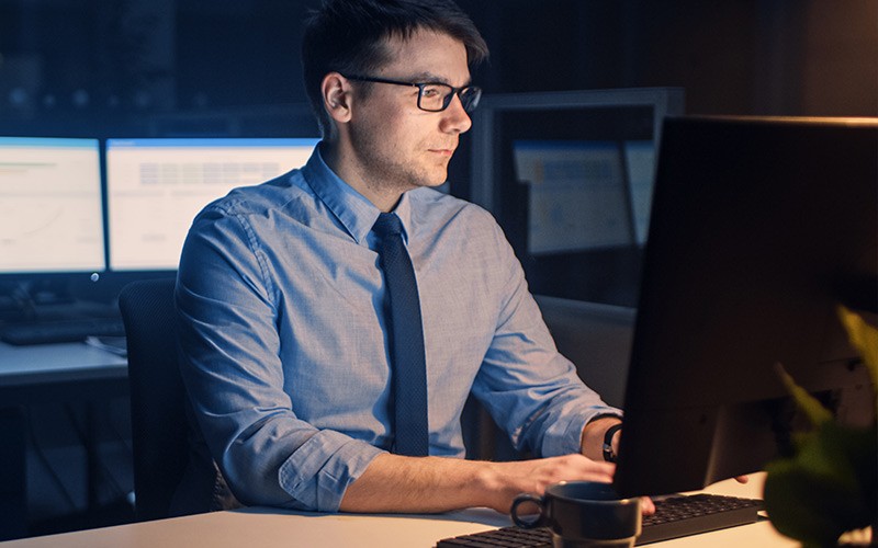 Professional working on his desktop