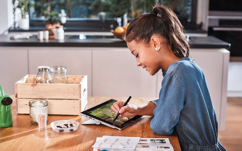 Elementary student working on tablet device