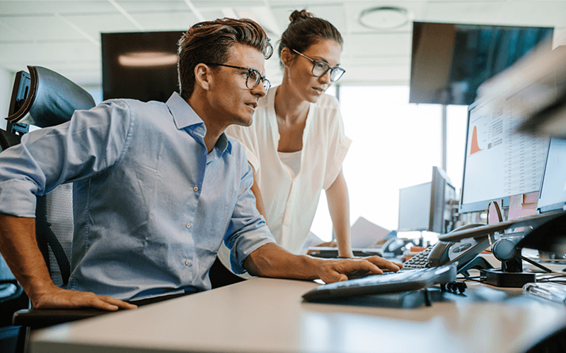 Man and woman collaborating