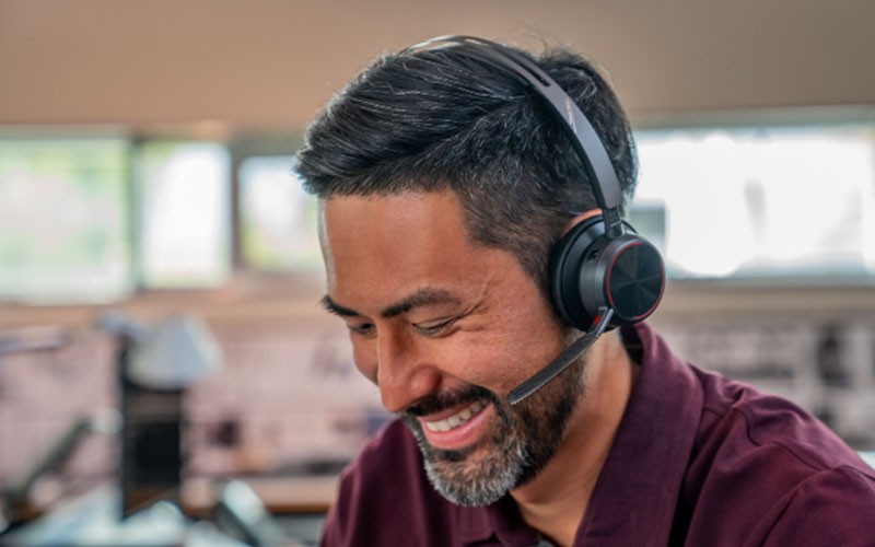 Employee using cordless headset