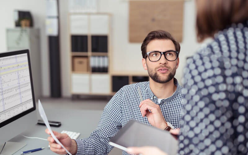 Business man discussing with colleague