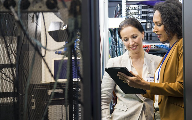 Two women in data center 