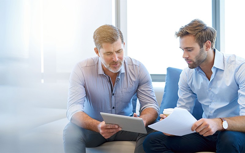 Two businessmen talking