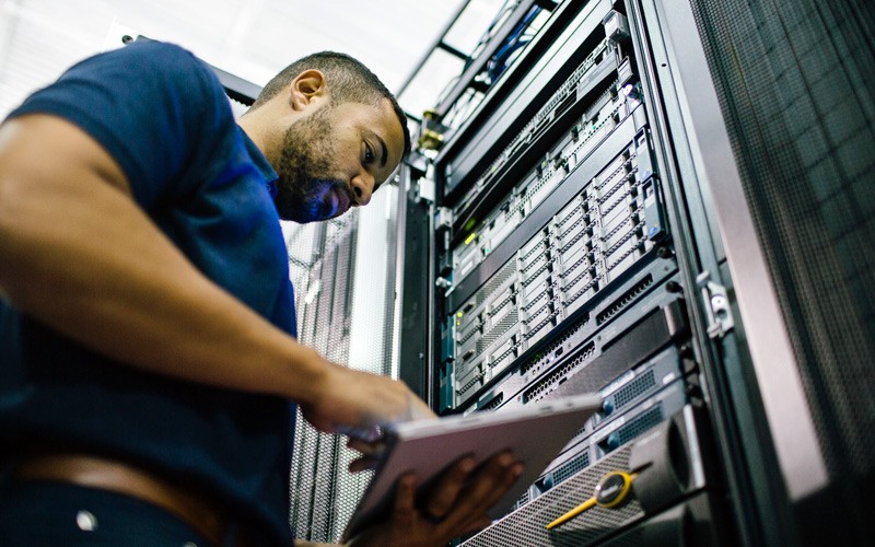 Man working in server room