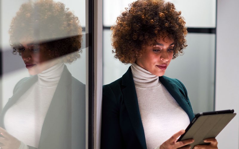 Businesswoman using tablet device