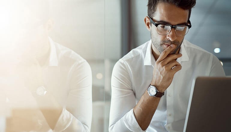 Businessman using laptop computer