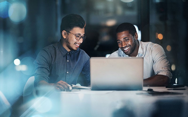 Two business colleagues collaborating in workplace